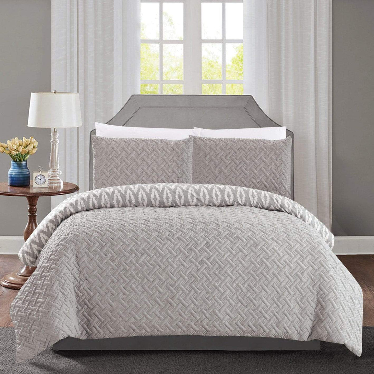 https://www.chichome.com/cdn/shop/products/chic-home-ora-7-piece-reversible-comforter-set-embossed-embroidered-geometric-bed-in-a-bag-silver-8-914040.jpg?v=1693288864&width=1200