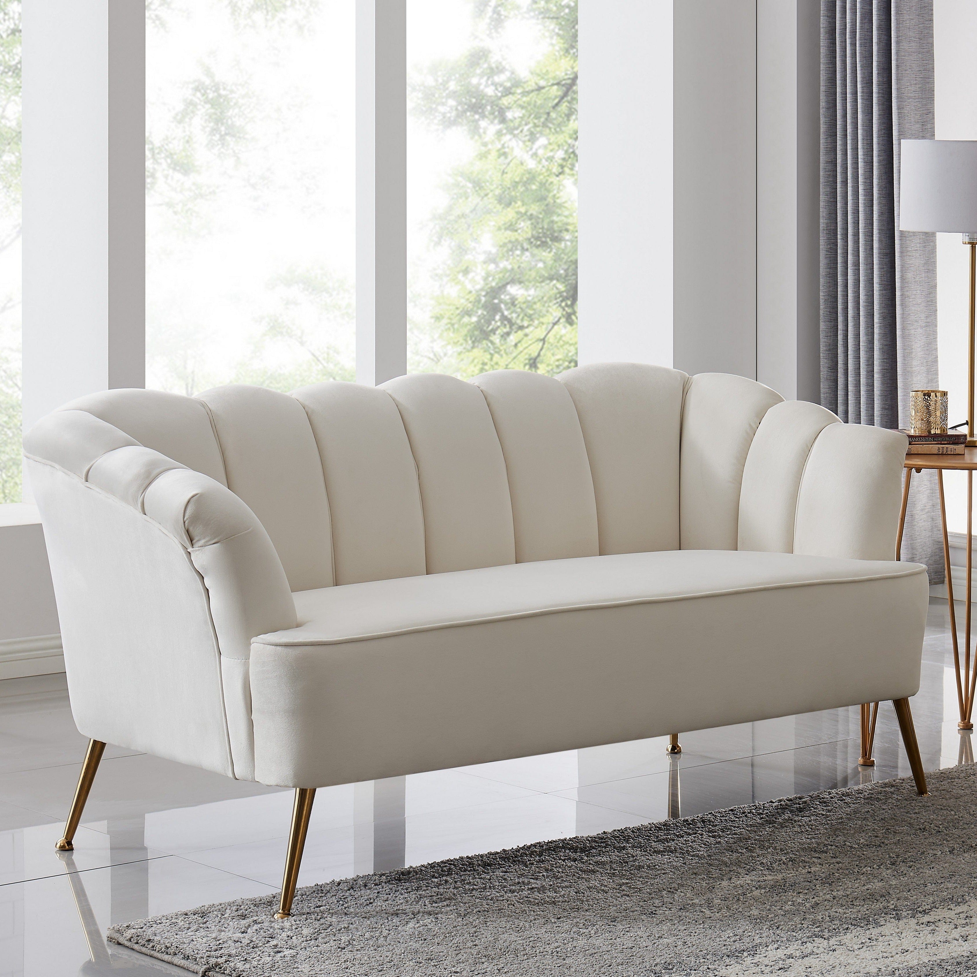 Cream sofa store with gold legs